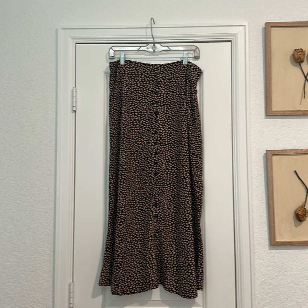L black skirt with yellow flowers